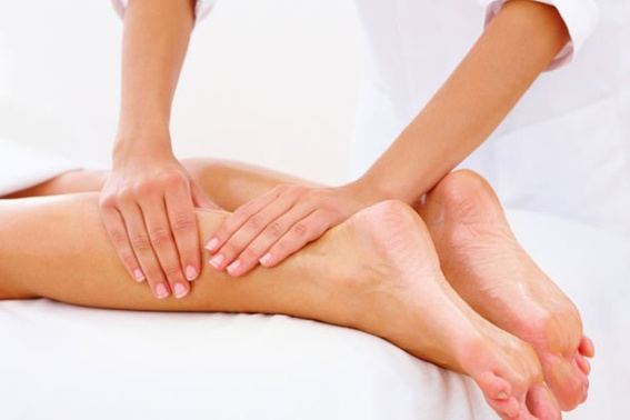 Person Receiving a Leg Massage